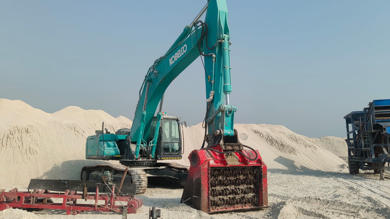 Excavator screening attachments demolition recycling field layout